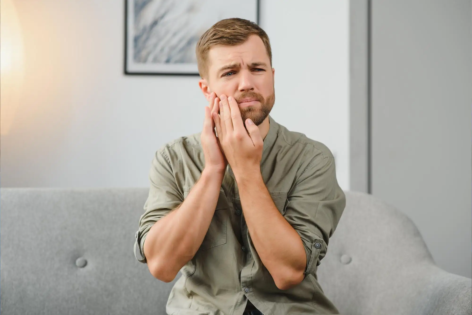TMJ-related jaw pain and discomfort, treated through specialized ear treatment services available to Sanford patients.