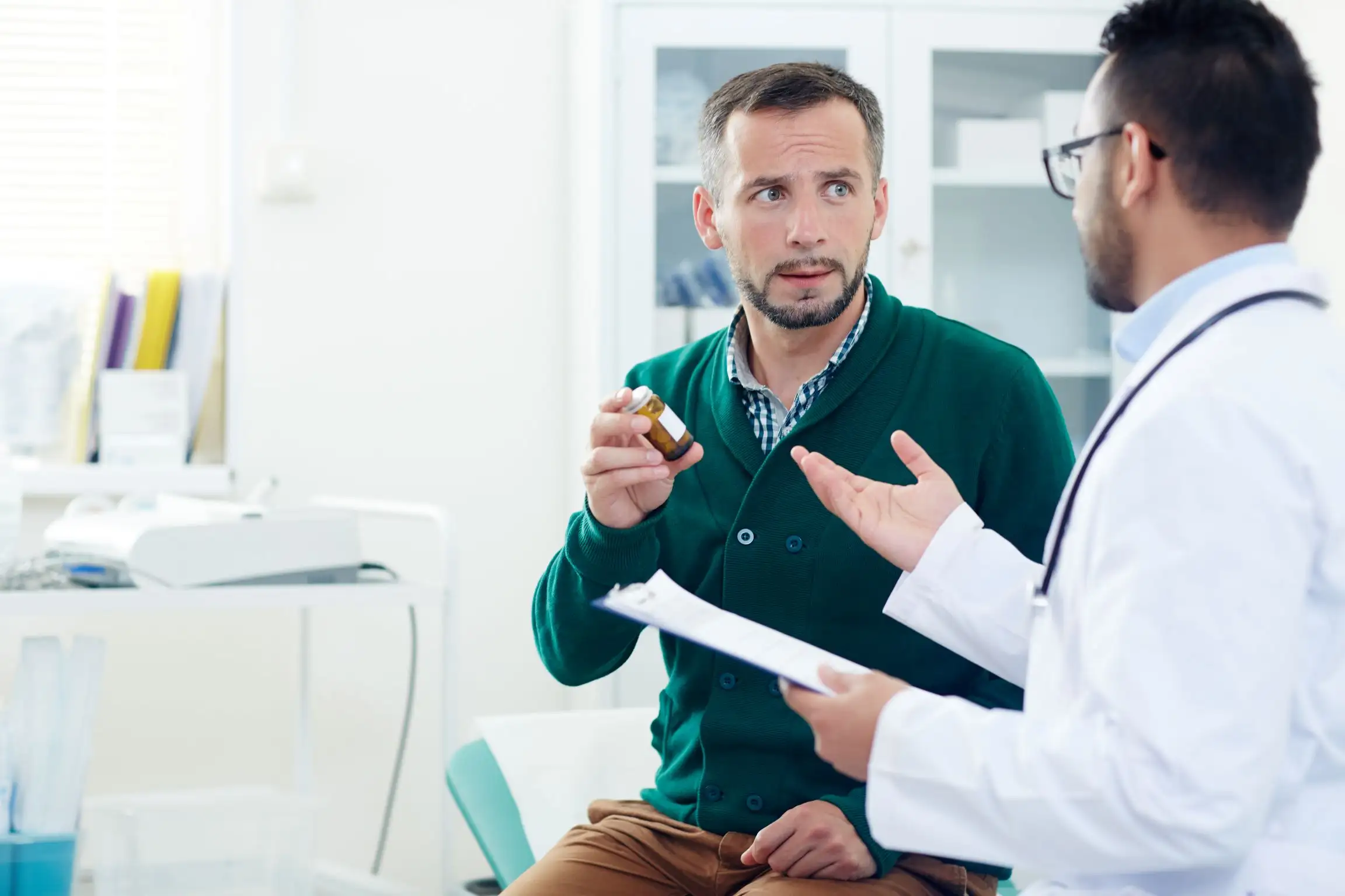 Doctor assessing ED patient