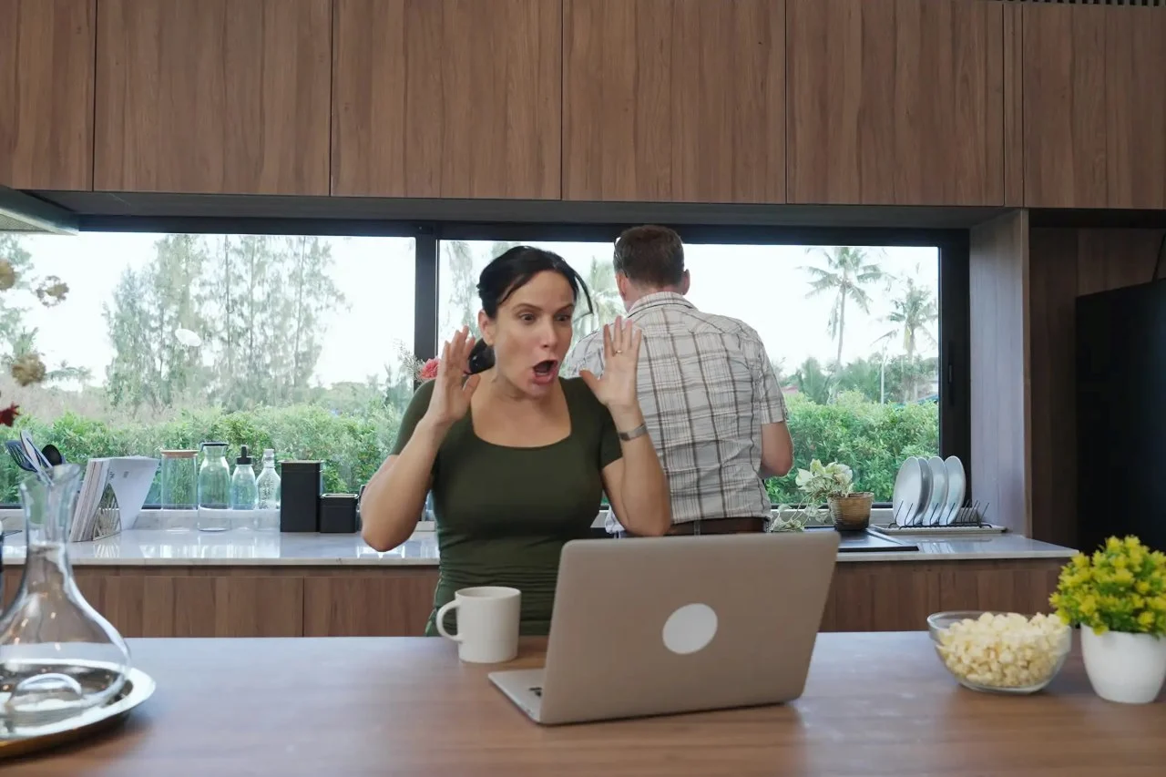 Woman experiencing emotional shock due to unexpected incident at home or work, highlighting trauma response.