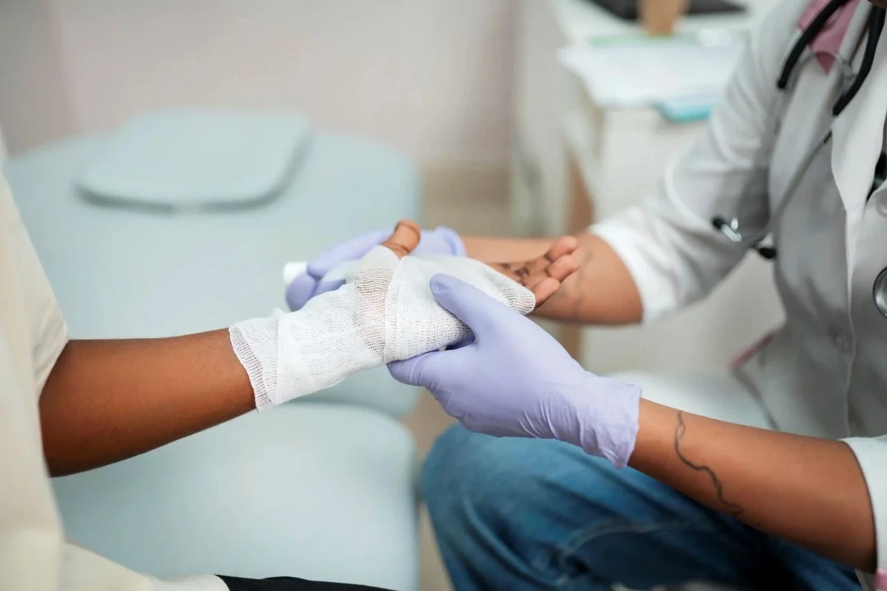 Healthcare provider performing follow-up exam