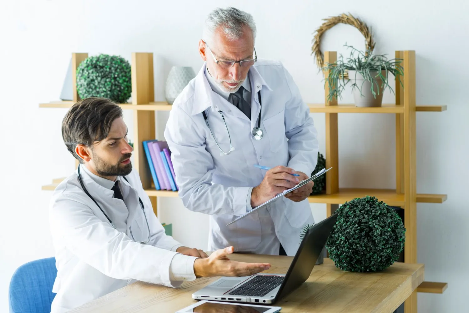 Healthcare providers conducting a risk-based cancer evaluation to determine appropriate screening recommendations.