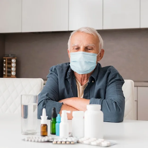 Older man surrounded by medications, reflecting common signs of opioid dependence in Fayetteville