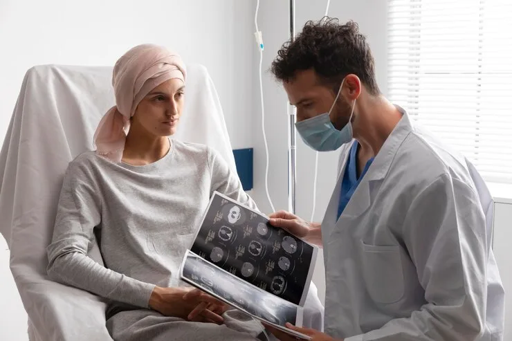A compassionate physician walks a patient through what to expect during their upcoming cancer screening visit at Rapid Care PLLC.